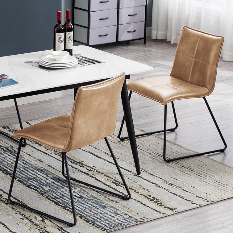 Dining table with discount tan leather chairs